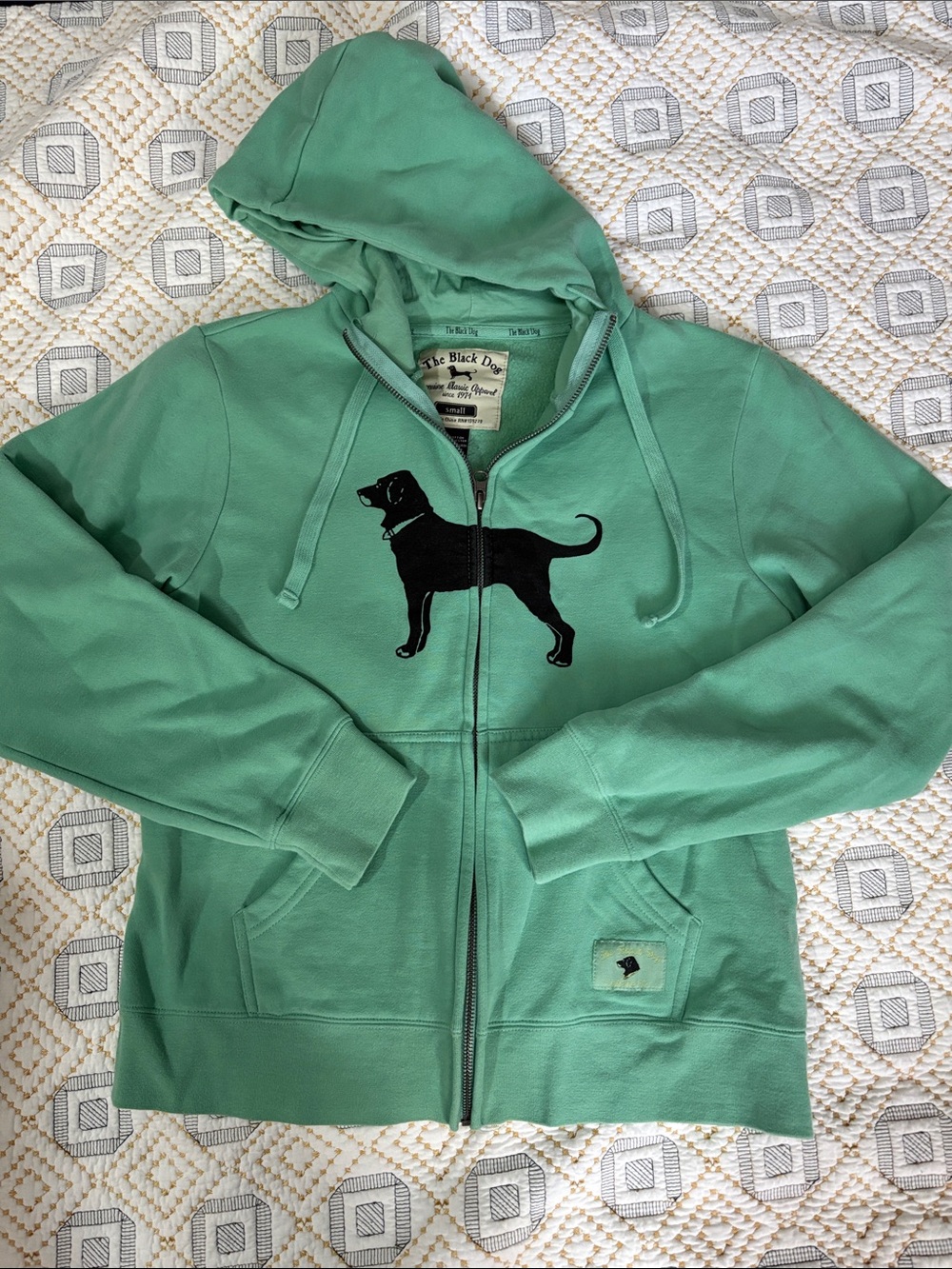 The Black Dog Mint Green Zip-Up Hoodie with Black Dog Graphic